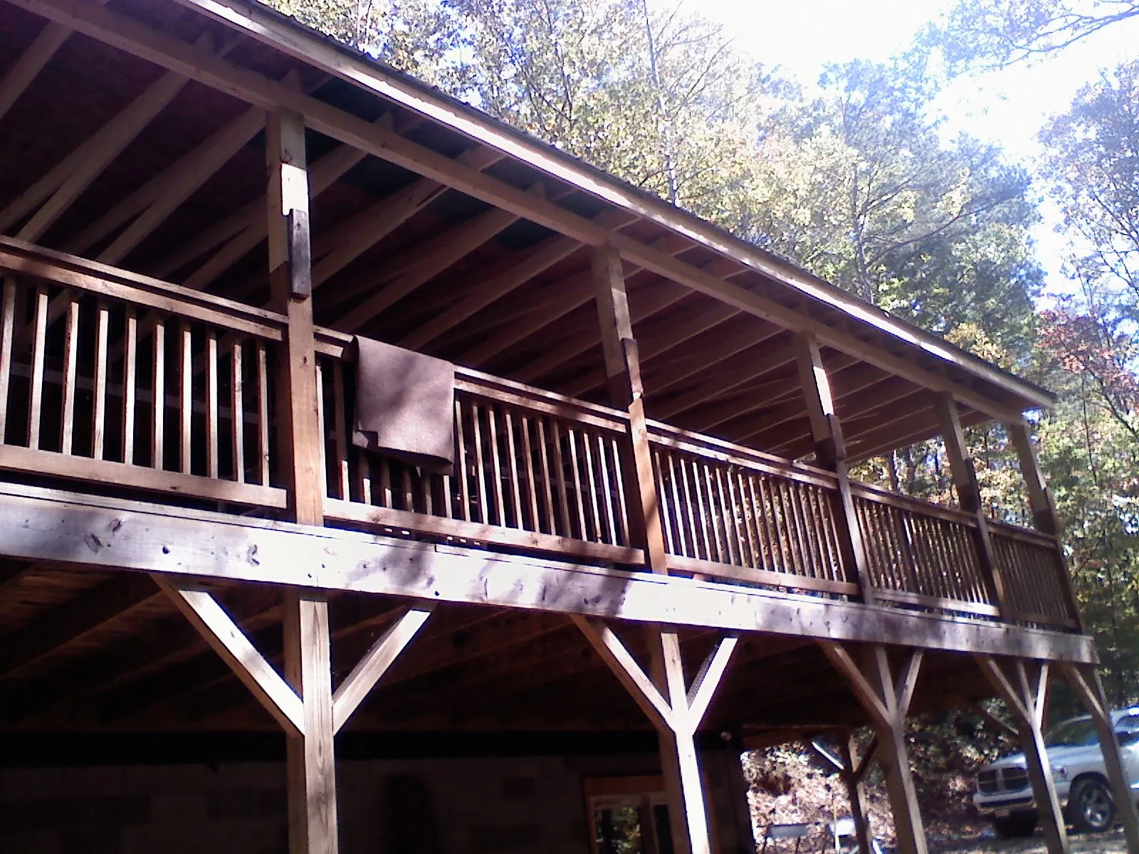 Timber framing under a new elevated porch and deck — Roof Leak Repair in Grandin by Roofing Brothers
